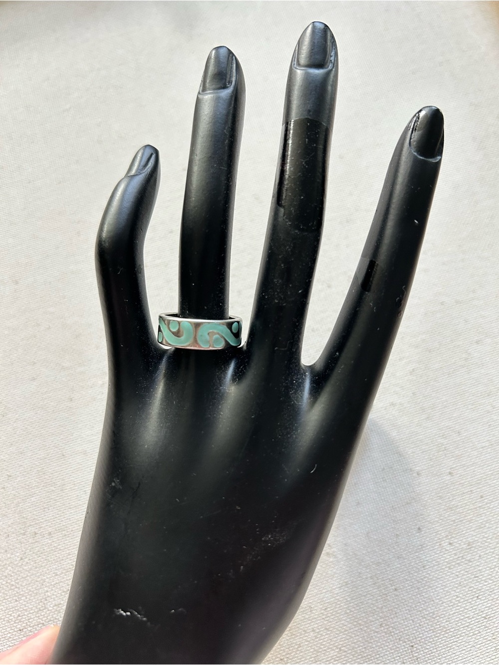 woman’s turquoise and silver ring